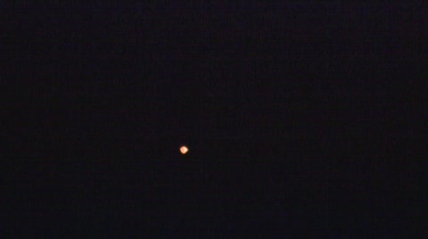 UFO (unidentified flying object) in the night sky