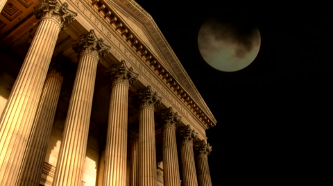 Ornate classical building with timelapse full moon