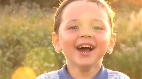 small happy boy laughing