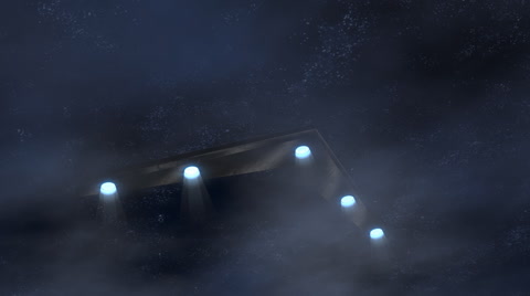 scary triangular ufo at night in the clouds