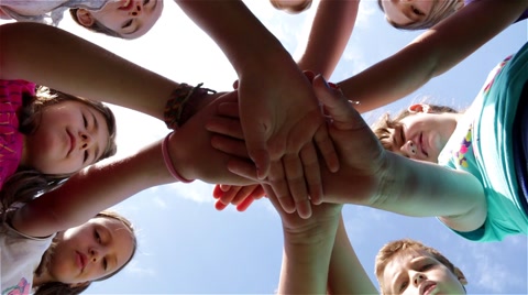 Children perform sports greeting with hands. Kids. Sports regards. Slow motion.