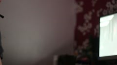 Young Adult Plays Online Games In Bedroom [140024742] | 写真素材・ストックフォトのアフロ