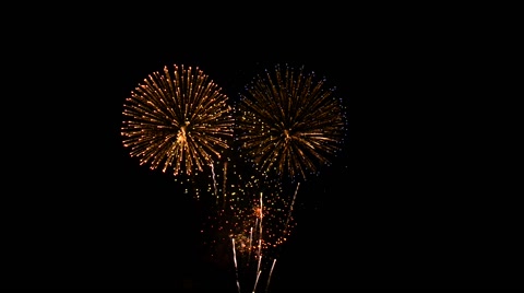 Fireworks of various colors against a black background