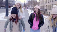 Group Of Teens Walk Down Sidewalk, Redhead Gives Blonde A Piggyback … [47406123] | 写真素材・ストックフォトのアフロ