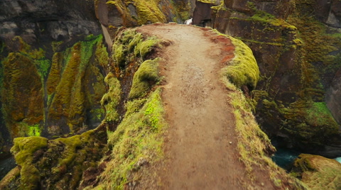 Drone Aerial Footage over the edge of magnificent canyon waterfall and river.