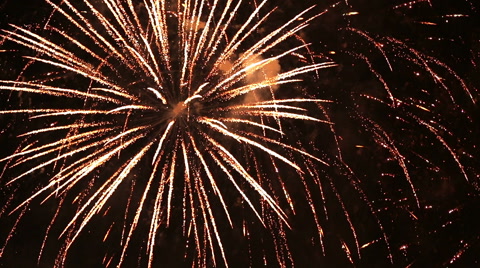 Grandiose celebratory fireworks in the night sky.