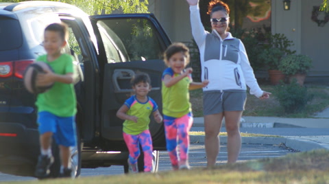 MOM DROPS KIDS OFF AT SOCCER PRACTICE SLOW MOTION