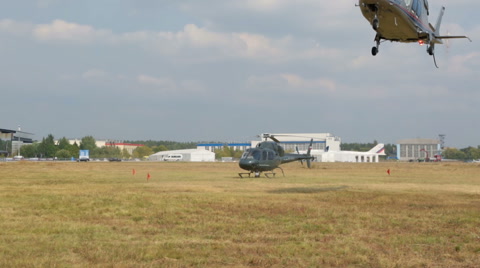 Italian Agusta A109S Grand helicopter landing in field [139816268]の動画素材 ...