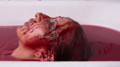 Girl dives and comes up from a Bath of Blood [48235266] | 写真素材・ストックフォトのアフロ