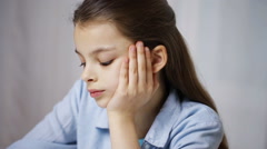 bored school girl with books and notepad at home [138540799] | 写真素材・ストックフォトのアフロ