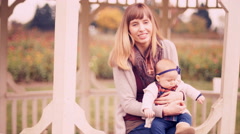 Portrait of a young woman with her baby daughter [47894830] | 写真素材・ストックフォトのアフロ