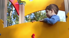 Little girl and boy laugh fun on playground in autumn day [47866725] | 写真素材・ストックフォトのアフロ