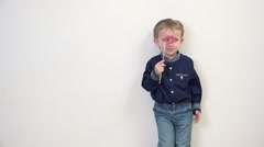 Lovely little boy wit a lips carnival mask, sweet kiss, white … [46645617] | 写真素材・ストックフォトのアフロ