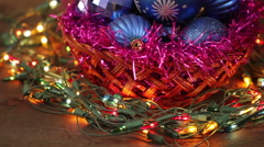 Blue balls in a wicker basket and garland flashing. Christmas … [46405409] | 写真素材・ストックフォトのアフロ