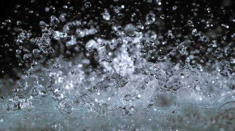 Close up water splash. Slow Motion.