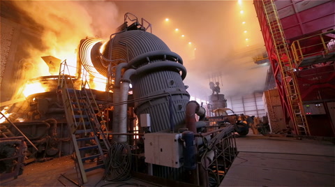 Steel Plant. Blast Furnance. Flaming Fire, Sparks and Smoke. Wide Panorama