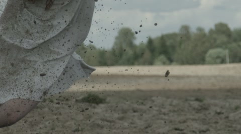 The explosion of the bomb. The wounded girl falls to the ground. War.