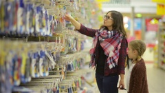 Young Mother and Her Daughter Doing Shopping Together in the … [45478572] | 写真素材・ストックフォトのアフロ