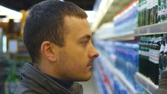 Man buys drinks in store. Close up [45472811] | 写真素材・ストックフォトのアフロ