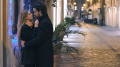 young couple is cuddle evening in a nice and empty street [44919282] | 写真素材・ストックフォトのアフロ