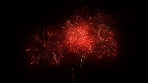 A set of slow motion colorful fireworks, isolated on black background