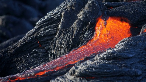 Shimmering heat from high temperature flow of slow moving volcanic lava Hawaii