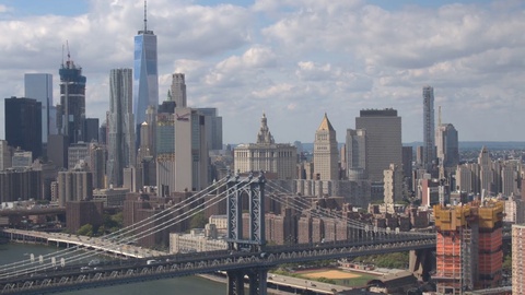 AERIAL: Busy Manhattan bridge freeway running from Brooklyn into New York City