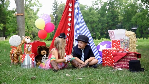 Children Playing Outside with Party Tent