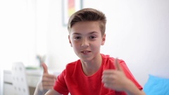 happy smiling preteen boy talking at home [138335168] | 写真素材・ストックフォトのアフロ