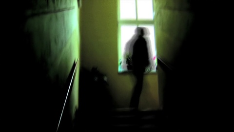 silhouette of a man walking upstairs, stroboscopic effect