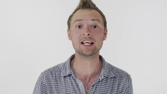 An angry man with wide open mouth is gesticulating [138286347] | 写真素材・ストックフォトのアフロ