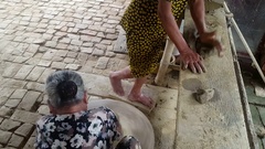 Closeup Woman Rolls out Clay by Hands and Rotates Tackle by … [139006305] | 写真素材・ストックフォトのアフロ