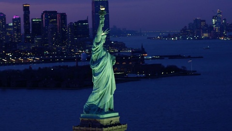 Aerial view of the Statue of Liberty at sunset. New York City, United States.