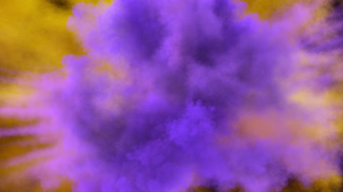 Colored smoke explosion with puff towards the camera, smoke hits camera's lense.