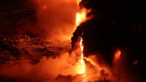 Hawaii Lava flowing in the ocean rock falls breaks off volcanic lava eruption