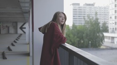 young female model in red hoodie [132486060] | 写真素材・ストックフォトのアフロ