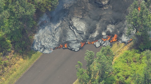 Aerial view volcanic lava cooling destroying roads property