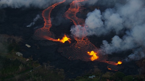 Aerial of volcanic magma destroying landscape Kilauea Hawaii