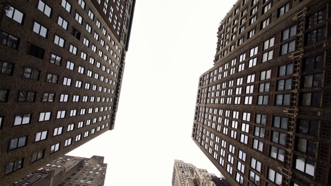 Aerial low angle shot of classical skyscrapers buildings in downtown NYC 