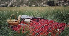 Closeup picnic blanket in the middle of mountain. [132376954] | 写真素材・ストックフォトのアフロ