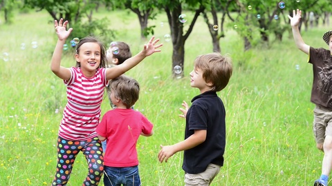 Kids Playing with Bubbles