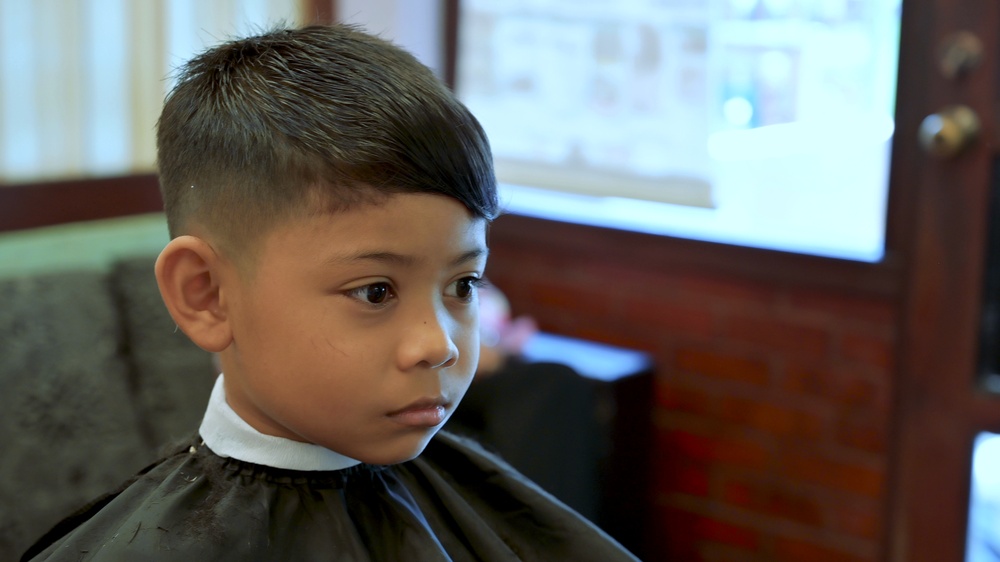 boy haircut by hair stylist Stock Video Footage - Alamy