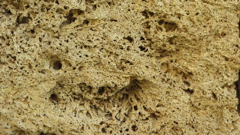 Porous texture of volcanic pumice stone in extreme closeup