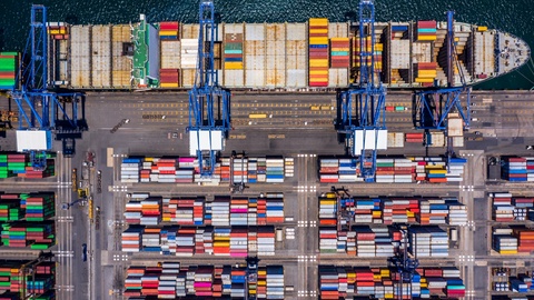 Aerial top view 4K Time lapse of container cargo ship in import export.