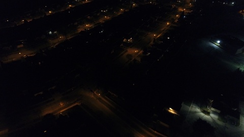 Top Down View Of Neighborhood At Night Aerial View