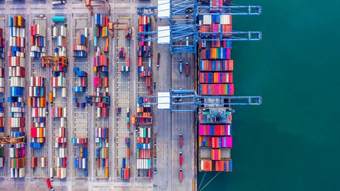 Container ship sailing through the ocean, Business logistics and transportation.