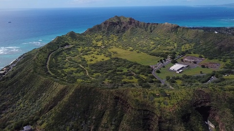 Cinematic Aerial of Diamond Head Park, Volcanic Tuff Cone on Oahu Island,