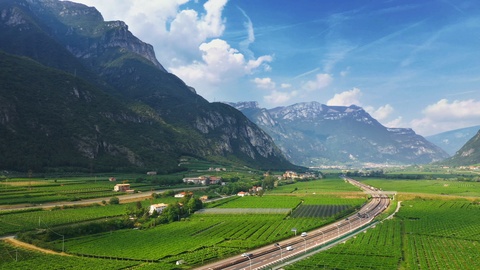 Aerial Drone View: Beautiful Farmlands of Italy Located in Mountains. Highway