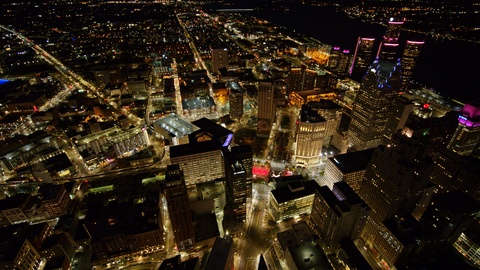 Detroit Michigan Aerial v145 Downtown birdseye cityscape at dusk night moving