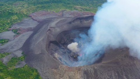 2019 - stunning dramatic aerial over Mt. Yasur volcano volcanic eruption lava on